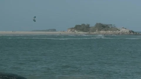 Slow Motion Kiteboarder Jumping on Water Near Island, Sunshine Coast Australia Stock Footage 341306829
