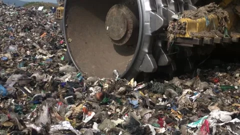 Slow Motion Landfill Compactor Processing Waste at Garbage Disposal Site Stock Footage 346819881