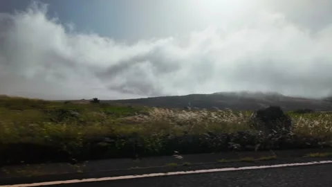 Slow motion landscape of dry hills and clouds, Haria, Lanzarote, Spain Stock Footage 346375886