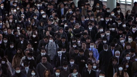 Slow motion of large crowd of business people inside Shinagawa Station.-Dan Stock Footage 124397694