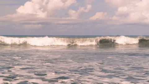 Slow motion of large ocean waves off the coast of the island of Bali  스톡 동영상 196868108