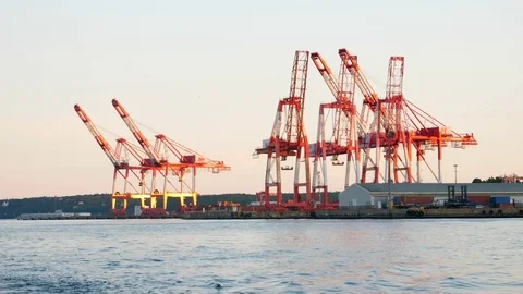 Slow motion large shipping container cranes at the ocean boat dock 스톡 동영상 82630574
