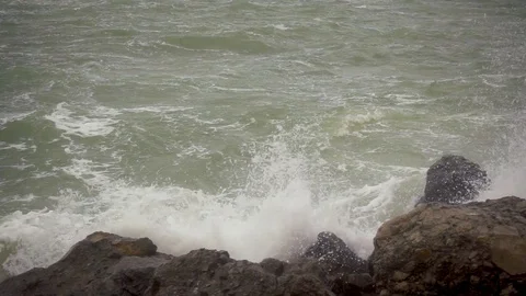 Slow motion large splashes from the broken wave Stock Footage 82174840
