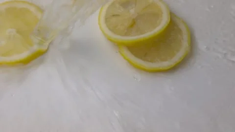 Slow motion of lemon Video stock 242624346