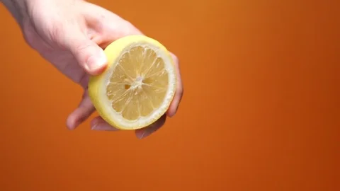 Slow Motion Lemon Squeeze Stock Footage 127051463