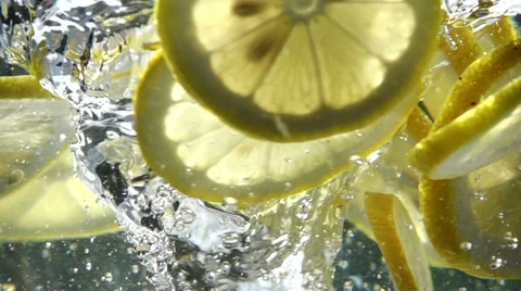Slow Motion Lemon in Whirlpool Stock Footage