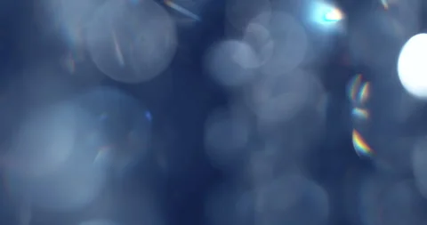 Slow motion of lens flare isolated on black background. Colored spectrum. Stock Footage 335773534