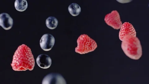 Slow motion of levitated flying berries Stock-Footage 103983361