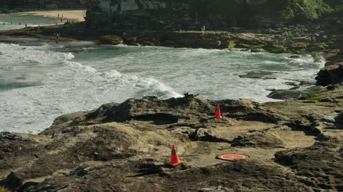 Slow motion life saving drone leaves Sydney cliff top 4K Video stock 275237648