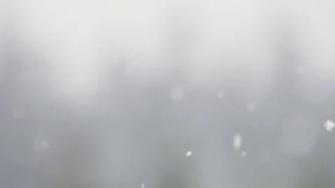 Slow motion light snowflakes snowfall pan sideways 動画素材 78451528