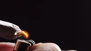 Slow motion lighting of marijuana cigarette Stock Footage 85578758