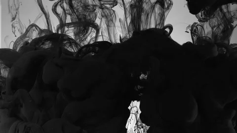 Slow motion of liquid black ink. Black cloud of ink on a white background Stock-Footage 160906610