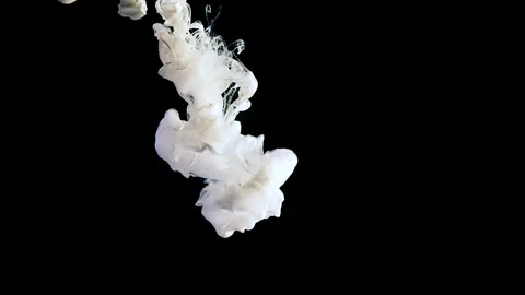 Slow motion of liquid white ink. White cloud of ink on a black background Video stock 160411404