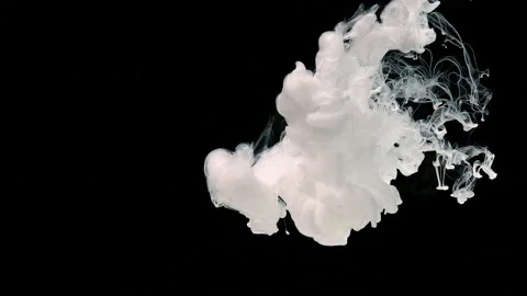 Slow motion of liquid white ink. Drops of white ink in water Stock-Footage 160738509