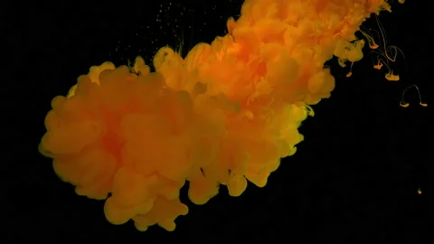Slow motion of liquid yellow paints. Yellow watercolor ink on a black background Stock-Footage 160606150