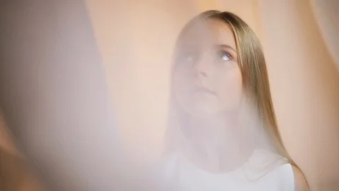 Slow motion little girl with a make-up looks at camera talk angry serious sad Stock Footage 98152353