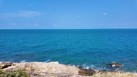 Slow motion little wave at view point samed island. Stockbeeldmateriaal 273966446