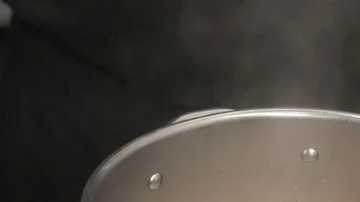 Slow motion Lobster Shells Simmering in a saucepan Stock Footage 85884200