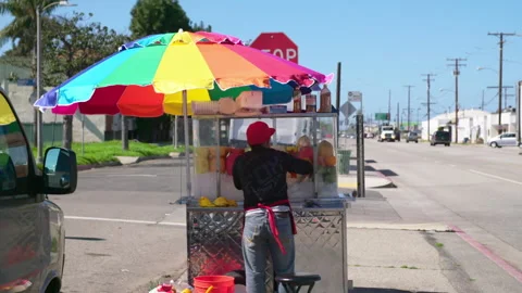 Slow Motion Lockdown Of A Street Vendor Selling Food  - Los Angeles, California Stock Footage 234082344