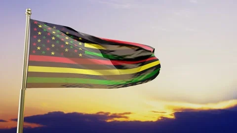 Slow motion loop of the alternative Juneteenth flag against the sunset Stock Footage 275520933