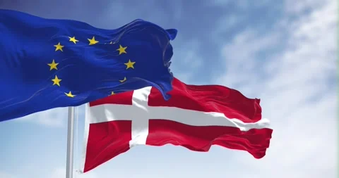 Slow motion loop of Denmark an EU flags waving on a clear day Stock Footage 242669132
