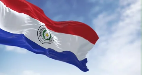 Slow motion loop of Paraguay flag waving against clear sky Stock Footage 242668925
