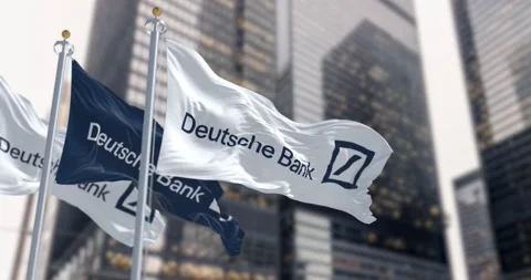 Slow motion loop of three Deutsche Bank flags waving in a financial district Stock Footage 236994209