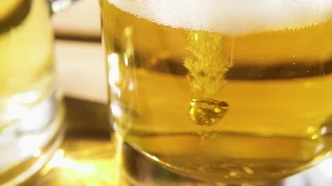 Slow motion a lot of bubbles in a light beer close-up Stock-Footage 90812757