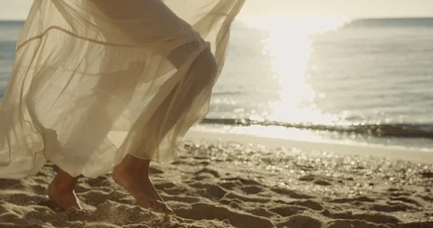 SLOW MOTION:, LOW ANGLE, CLOSE UP, DOF Unrecognizable woman running in the hot Stock Footage 108887076