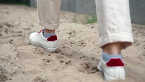 SLOW MOTION:, LOW ANGLE, CLOSE UP, DOF Unrecognizable woman going in the hot Video stock 157594506