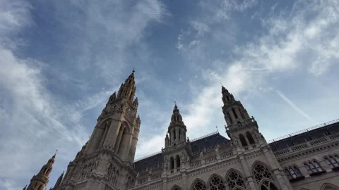 Slow motion low-angle footage of the historic spires of the Vienna City Hall Stock Footage 344432037