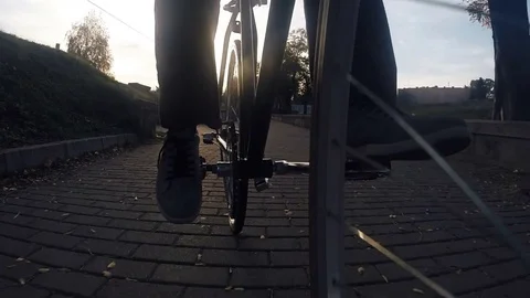Slow motion of low angle view of bicycle riding Stock Footage 70851869