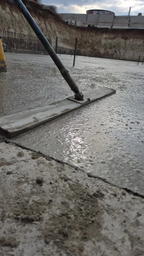 Slow motion low angle view of smoothing fresh concrete side Stock-Footage 335068775