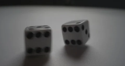 Slow motion macro close up of dice on white background Video stock 129967536