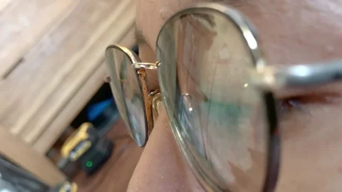 Slow Motion Macro Close Up Eye and Screen Reflection on Eyeglasses Stock Footage 338085705