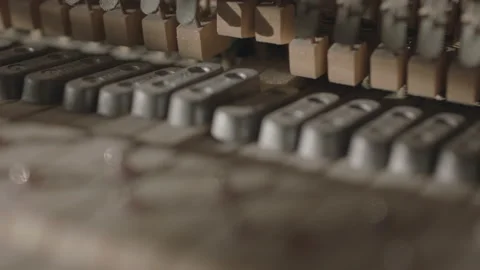 Slow Motion macro Footage of Hammer Mechanics on the Inside of an Upright Piano Stock Footage 217582630