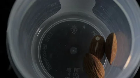 Slow Motion Macro Shot Of ALmonds Stock Footage 192057991