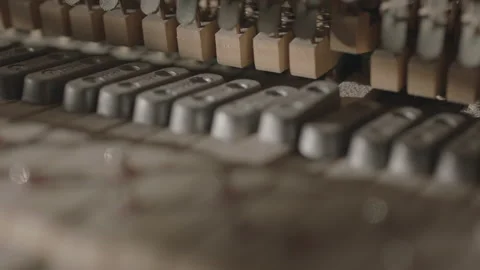 Slow Motion Macro Shot of Hammer Mechanics on Inside of an Upright Piano Stock Footage 217582611