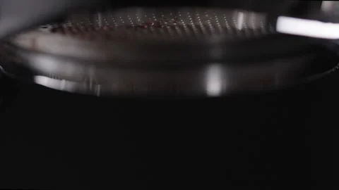 Slow motion macro shot of pulling espresso shot with bottomless portafilter Stockbeeldmateriaal 195807052