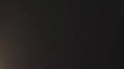 Slow motion macro shot of sand dust explosive flow for overlay Stock Footage