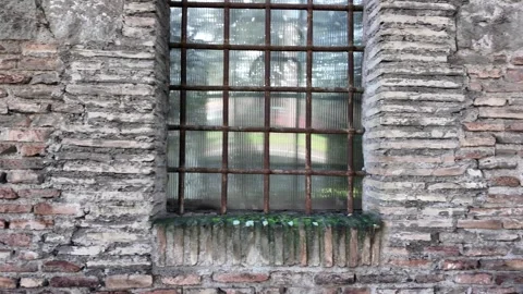 Slow Motion Macro Shot Of Stone Tracery And Colored Glass In Old Church Window Video stock 330123348