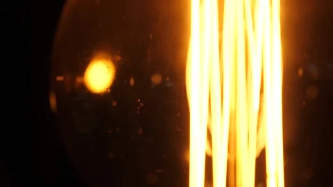 Slow Motion Macro shots of Flickering Light Bulb Stock Footage 139231777