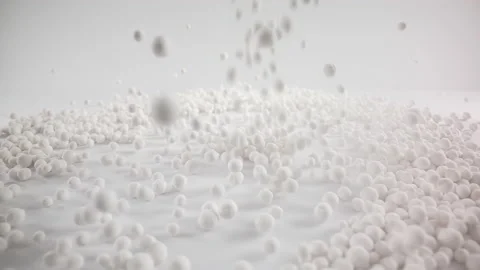 Slow Motion Macro of White Sorbent Particles Falls Stock Footage