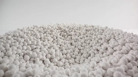 Slow Motion Macro of White Sorbent Particles Falls Stock Footage 171188162