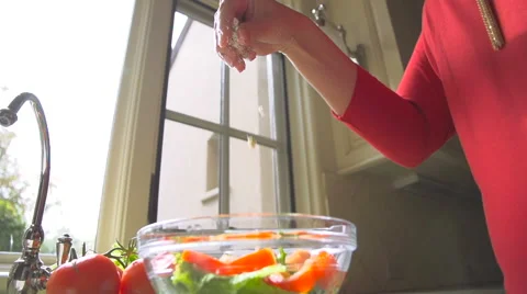 Slow Motion Making a Salad and Adding Cheese Stock Footage 62356659