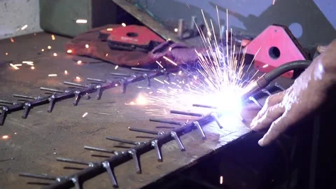 Slow motion. Man doing welding work. Welder welding a metal. Stock Footage 159744570