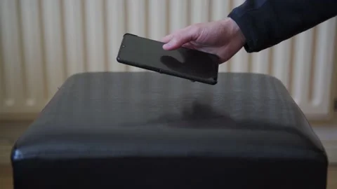 Slow motion of a man dropping a smartphone Video stock 132350195