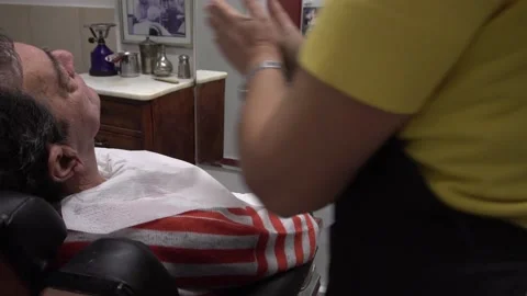 Slow motion of a man getting a shave 스톡 동영상 141384293