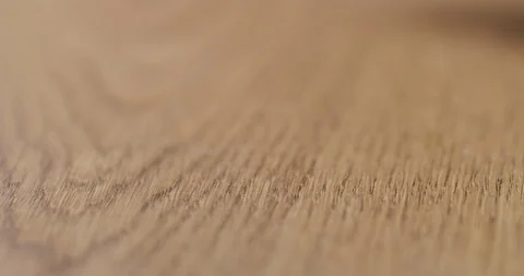 Slow motion man hand touch oil finished oak wood surface Stock Footage 117770166