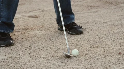 Slow motion of a man hitting a golf ball out of sand trap 스톡 동영상 54620813